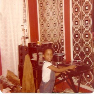 young DJ Spinna spinning.